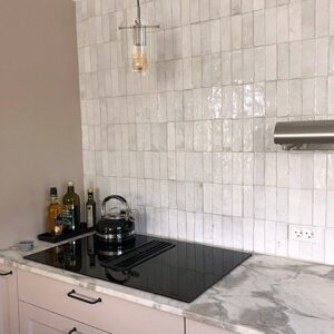 Bejmat-tiles-white-herringbone-mother-of-pearl Authentic handmade Bejmat tiles in white, from Fez. Rich texture, natural clay & glossy glaze—perfect for floors, splashbacks & feature spaces