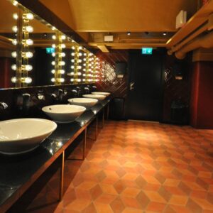 Diamond-shaped handmade encaustic cement tile in soft Nordic colors. Durable, contemporary, and perfect for unique walls or floors.