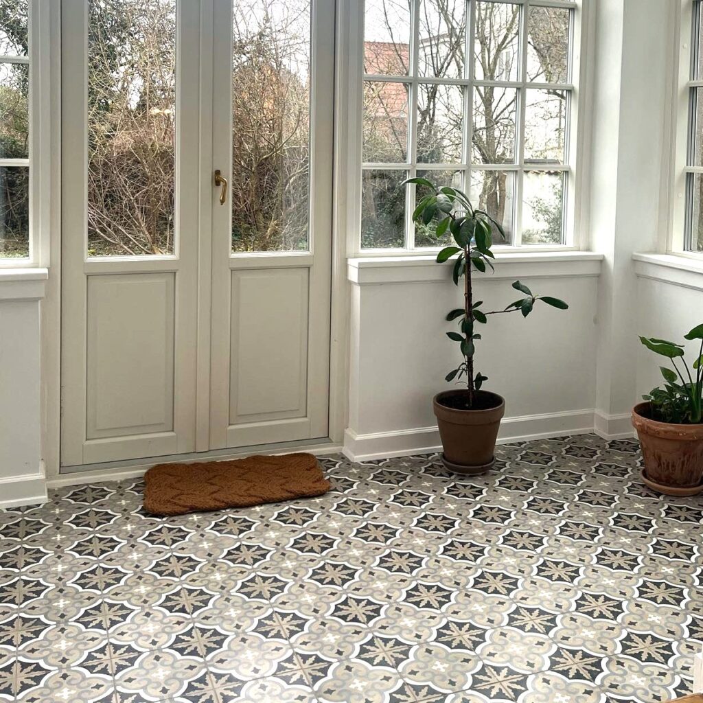 This handmade encaustic cement tile in Art Nouveau style brings timeless elegance to your interior. A classic European pattern in Nordic colors.