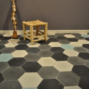 This handmade encaustic cement tile in classic style brings timeless elegance to your interior. An hexagon shape in Nordic colors.