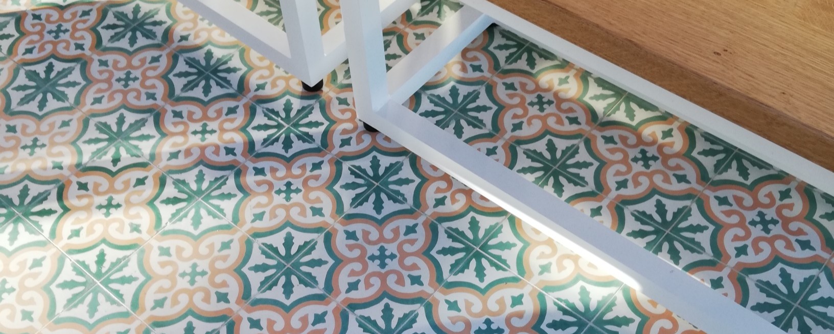 Handmade encaustic cement tile sin a classic european pattern, featuring refined Nordic colors.