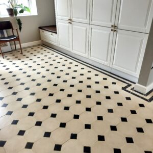 OktagonfliseCreme-Sort18 This handmade encaustic cement tile in classic style brings timeless elegance to your interior. A refined shape in Nordic colors.