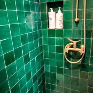 Zellige-tiles-green-bathroom Authentic handmade Zellige tiles from Fez. Rich texture, natural clay & glossy glaze—perfect for walls, splashbacks & feature spaces