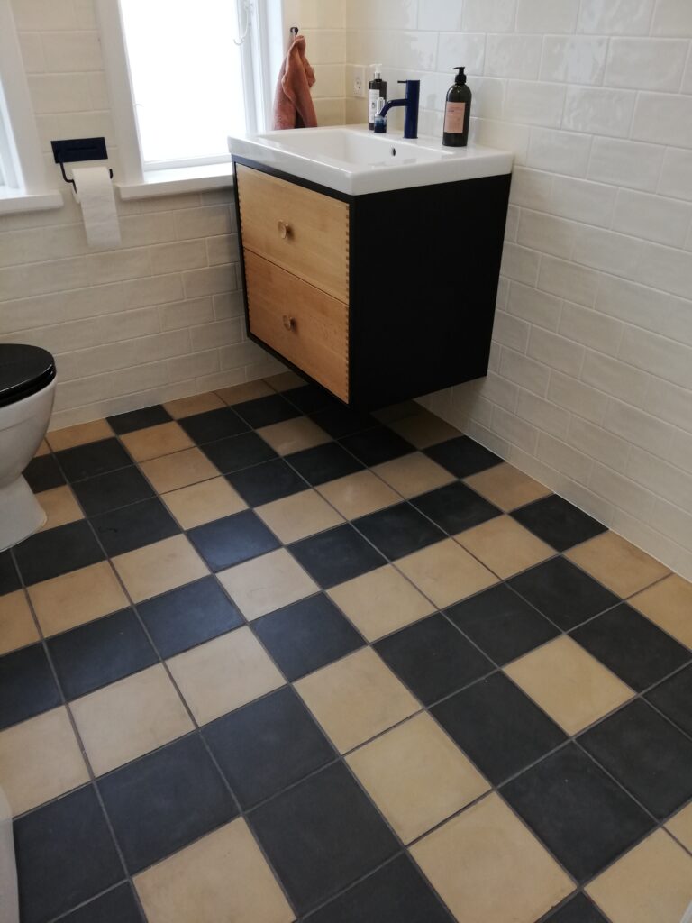 Handmade encaustic cement tile in a soft Nordic color with subtle debth. Durable, contemporary, and perfect for unique walls or floors.