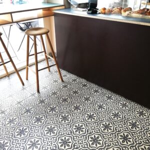 encaustic-cement-tiles-black-white-bakery This handmade encaustic cement tile in Art Nouveau style brings timeless elegance to your interior. A classic European pattern in Nordic colors.