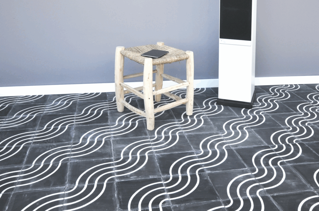 This handmade encaustic cement tile in contemporay style brings timeless elegance to your interior. A refined yet simple pattern in Nordic colors.