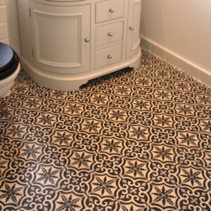 encaustic-cement-tiles-black-white-pattern-bath This handmade encaustic cement tile in Art Nouveau style brings timeless elegance to your interior. A classic European pattern in Nordic colors.