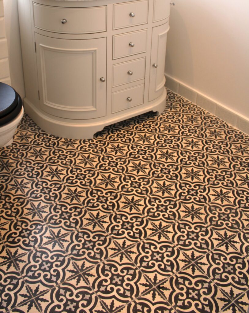 This handmade encaustic cement tile in Art Nouveau style brings timeless elegance to your interior. A classic European pattern in Nordic colors.