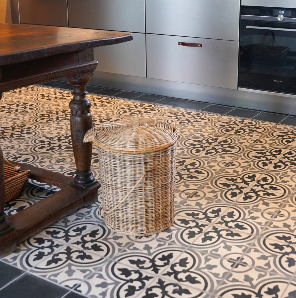 This handmade encaustic cement tile in classic style brings timeless elegance to your interior. A refined European pattern in Nordic colors.