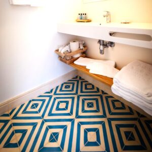 This handmade encaustic cement tile in contemporay style brings timeless elegance to your interior. A refined geometric pattern in Nordic colors.