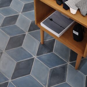 Diamond-shaped handmade encaustic cement tiles in soft Nordic colors. Durable, contemporary, and perfect for unique walls or floors.