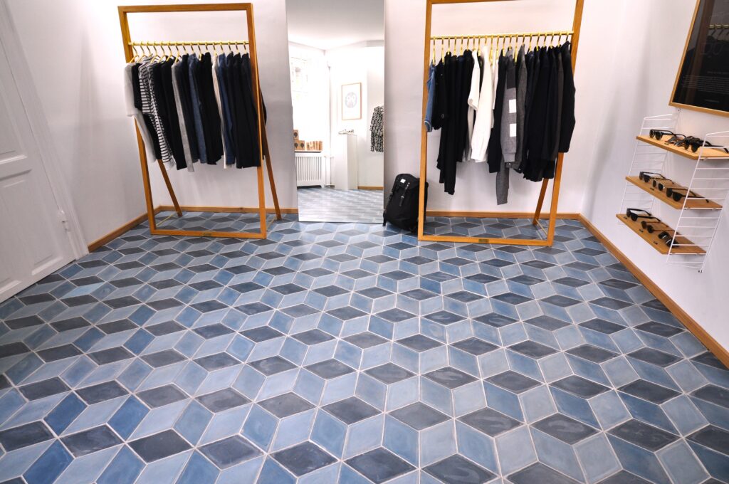 Handmade encaustic cement tiles in diamond shape and a mix of blue colors. Made by Villa Tiles.