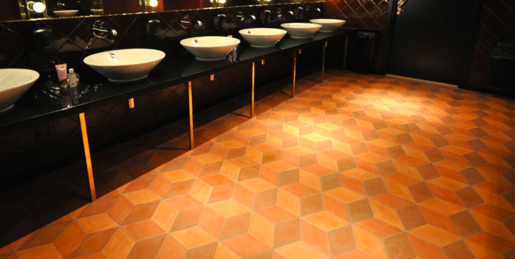 Diamond-shaped handmade encaustic cement tiles in soft Nordic colors. Durable, contemporary, and perfect for unique walls or floors.