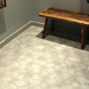 Diamond-shaped handmade encaustic cement tiles in soft Nordic colors. Durable, contemporary, and perfect for unique walls or floors.