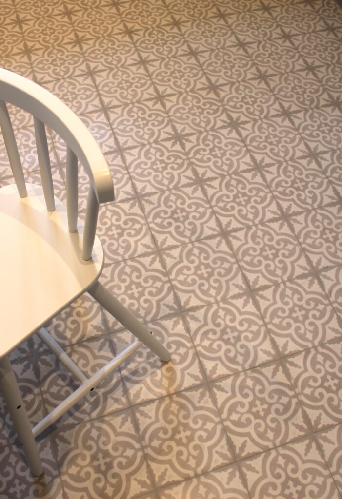 This handmade encaustic cement tile in Art Nouveau style brings timeless elegance to your interior. A classic European pattern in Nordic colors.