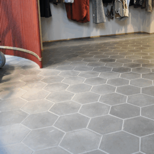 This handmade encaustic cement tile in classic style brings timeless elegance to your interior. An hexagon shape in Nordic colors.