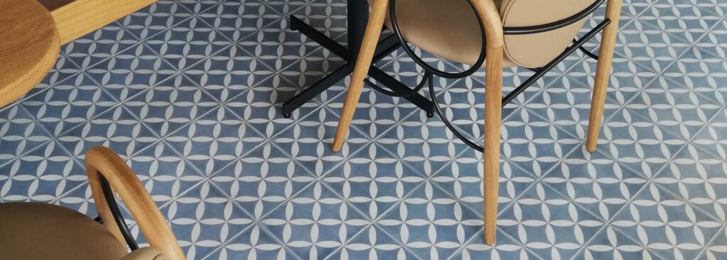 This handmade encaustic cement tile in classic style brings timeless elegance to your interior. A refined European pattern in Nordic colors.