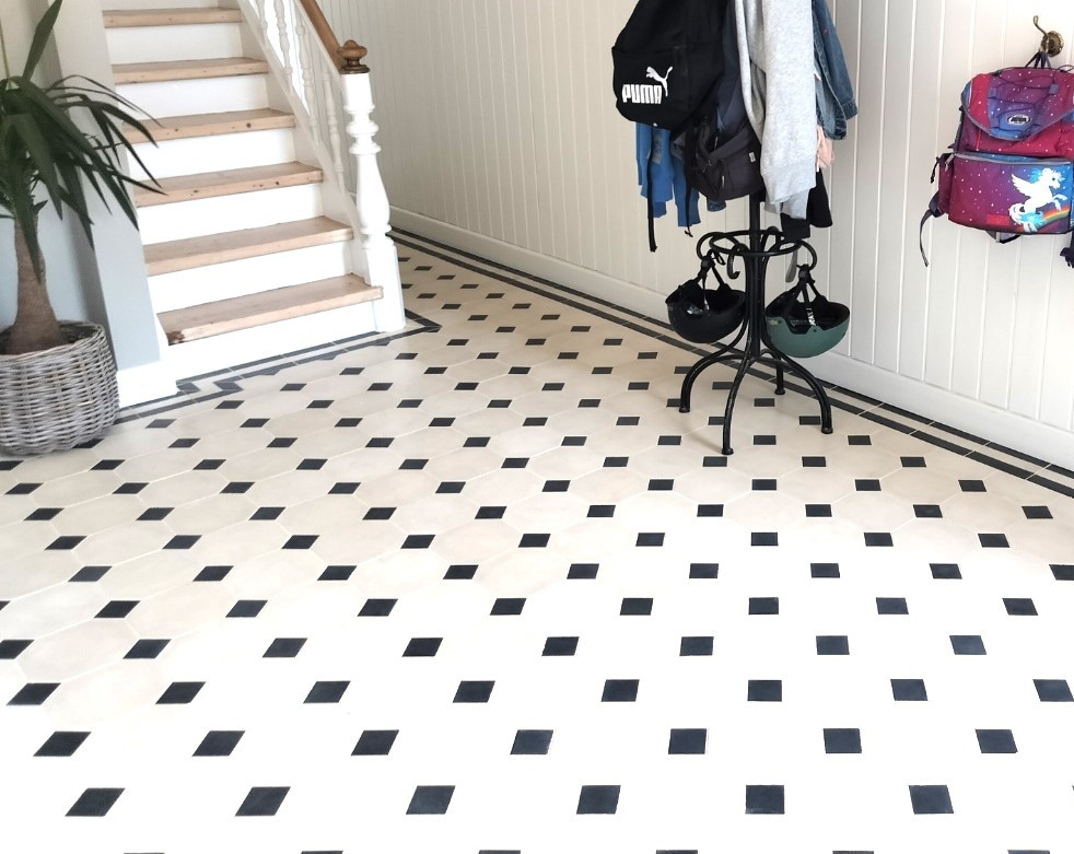 handmade encaustic cement tiles in classic octagon shape in soft creme with black. Tailored made edge tiles - all created by Villa Tiles.
