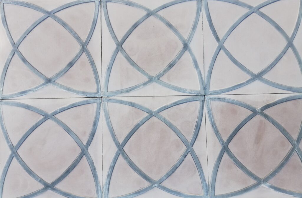This handmade encaustic cement tile in contemporay style brings timeless elegance to your interior. A refined pattern in Nordic colors.
