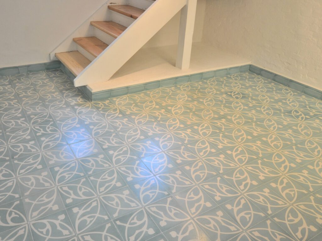 This handmade encaustic cement tile in classic style brings timeless elegance to your interior. A refined European pattern in Nordic colors.