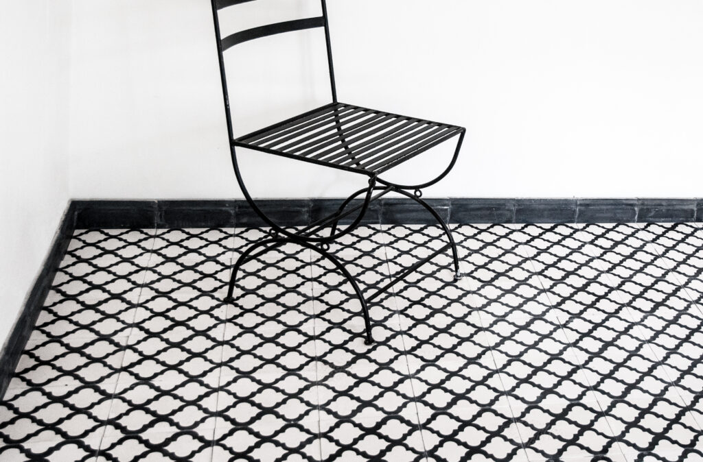 This handmade encaustic cement tile in classic style brings timeless elegance to your interior. A refined elegant pattern in Nordic colors.