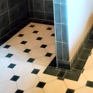 Discover handmade coved corner tiles in marble-cement — elegant curved tiles for seamless wall and floor transitions, crafted in Danish design.