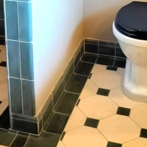 Discover handmade edge tiles in marble-cement — elegant curved tiles for seamless wall to wall transitions, crafted in Danish design.